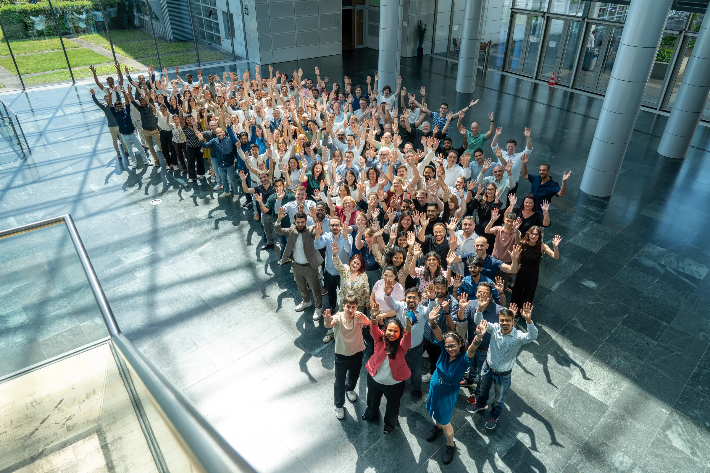 The FrontWell team together, waving at the camera.